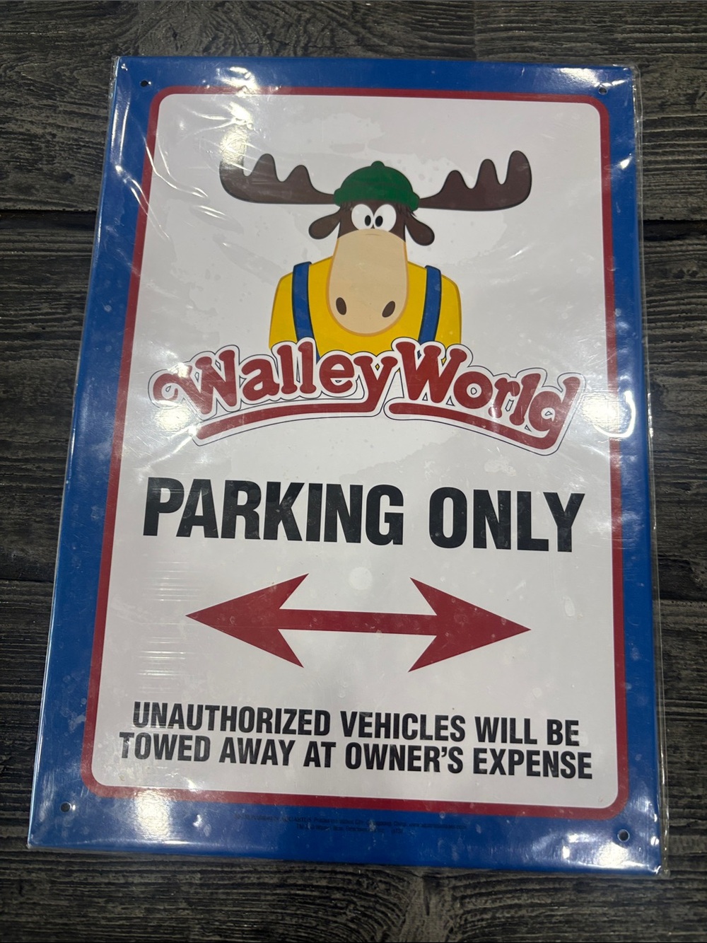 Blue and White 'Parking Only' Metal Sign